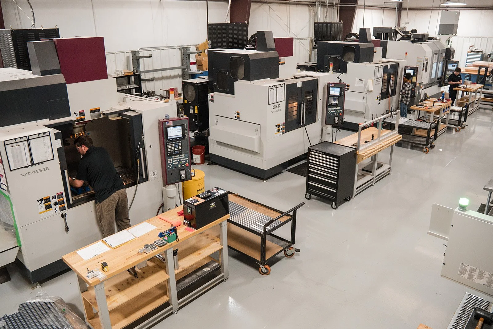 CNC machine shop interior with precision engineering equipment